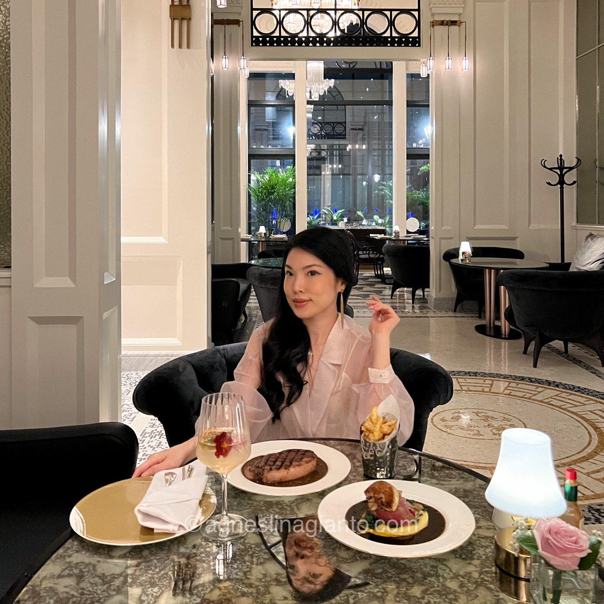 Asian female having dinne at an upscale restaurant in Jakarta