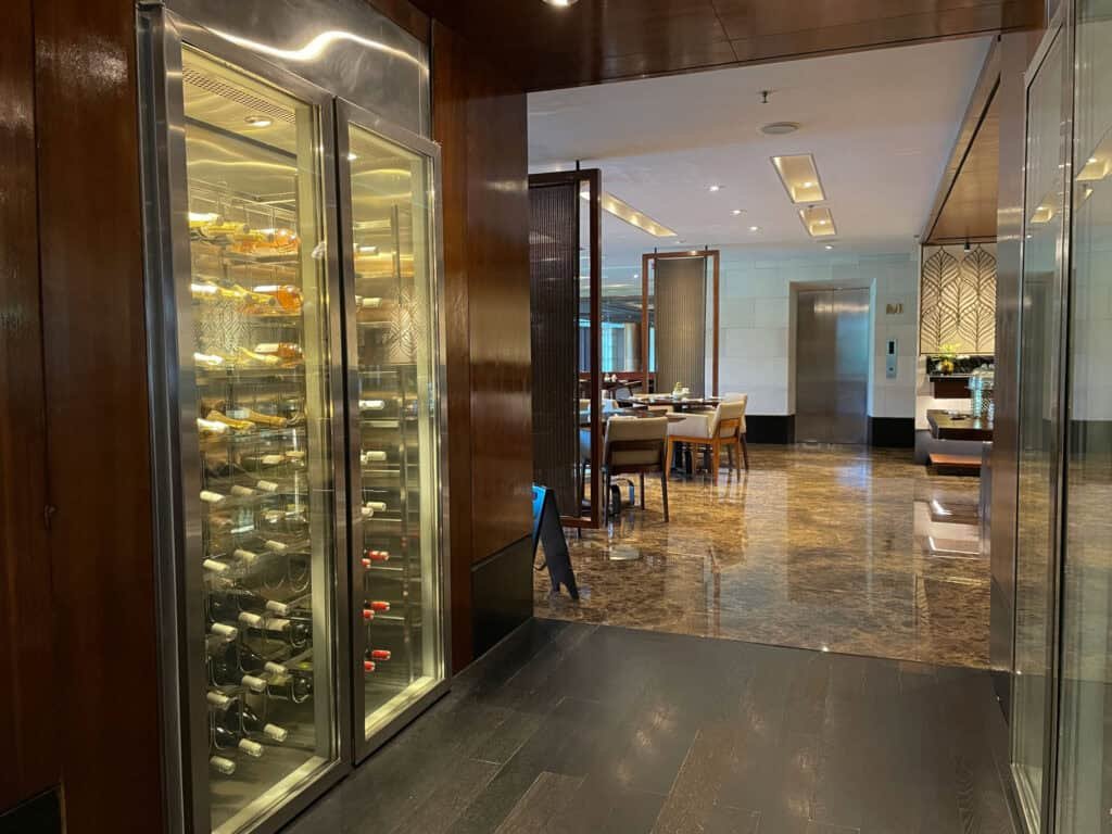 The wine wall and corridor leading into Club Millésime at Sofitel Bali Nusa Dua