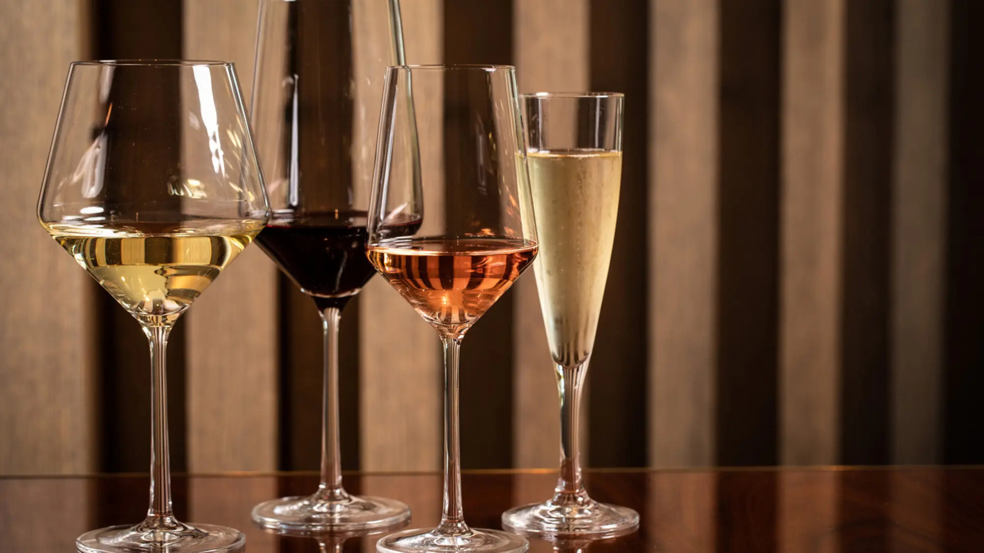 Four wine glasses poured at Adorn Bar & Restaurant, Chicago
