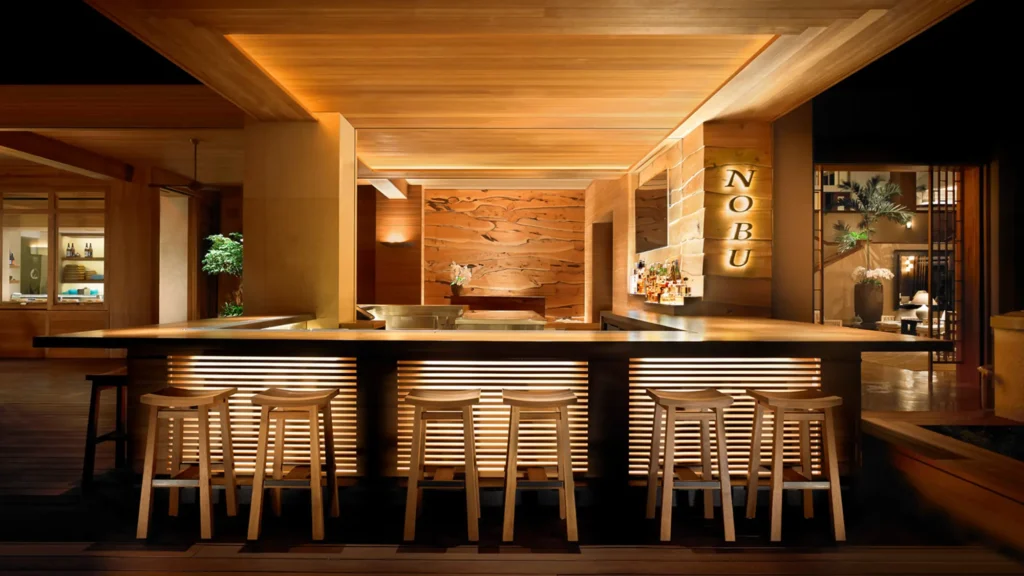 The bar at Nobu Lanai, stools along a timber counter