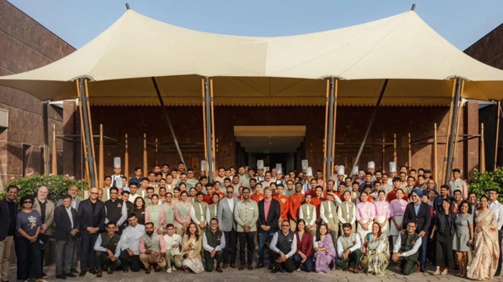 Staff gathered under the tented pavilion at JW Marriott Ranthambore
