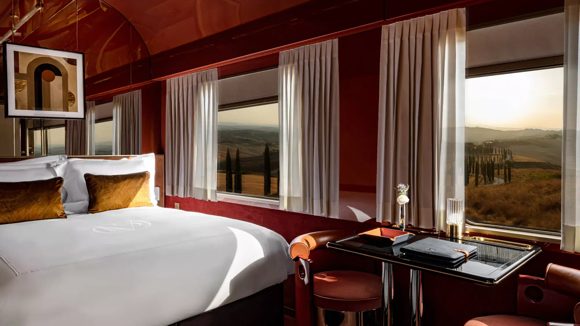 Suite aboard La Dolce Vita Orient Express with a countryside view