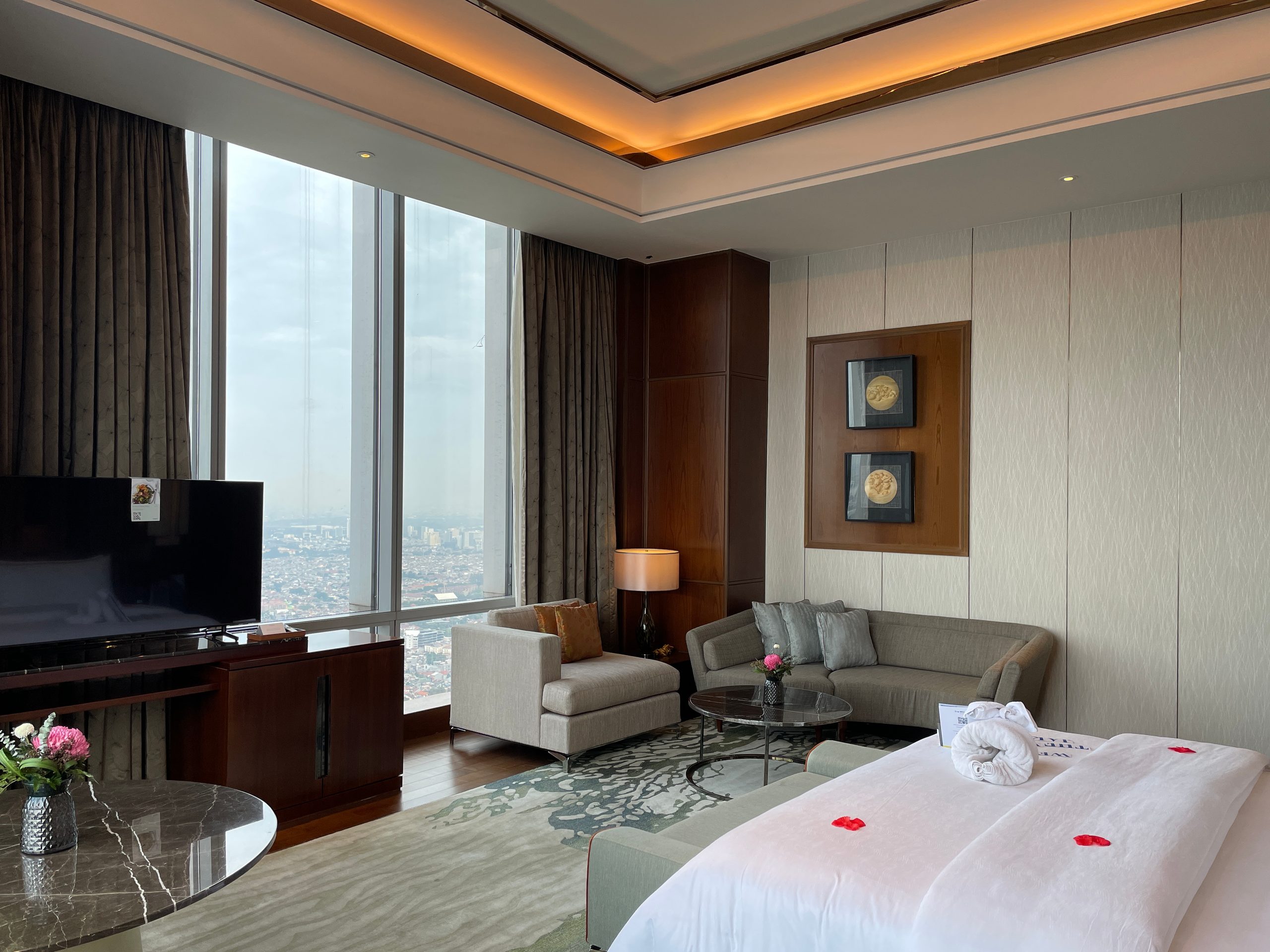 The sitting corner beside the bedroom window — The Westin Jakarta