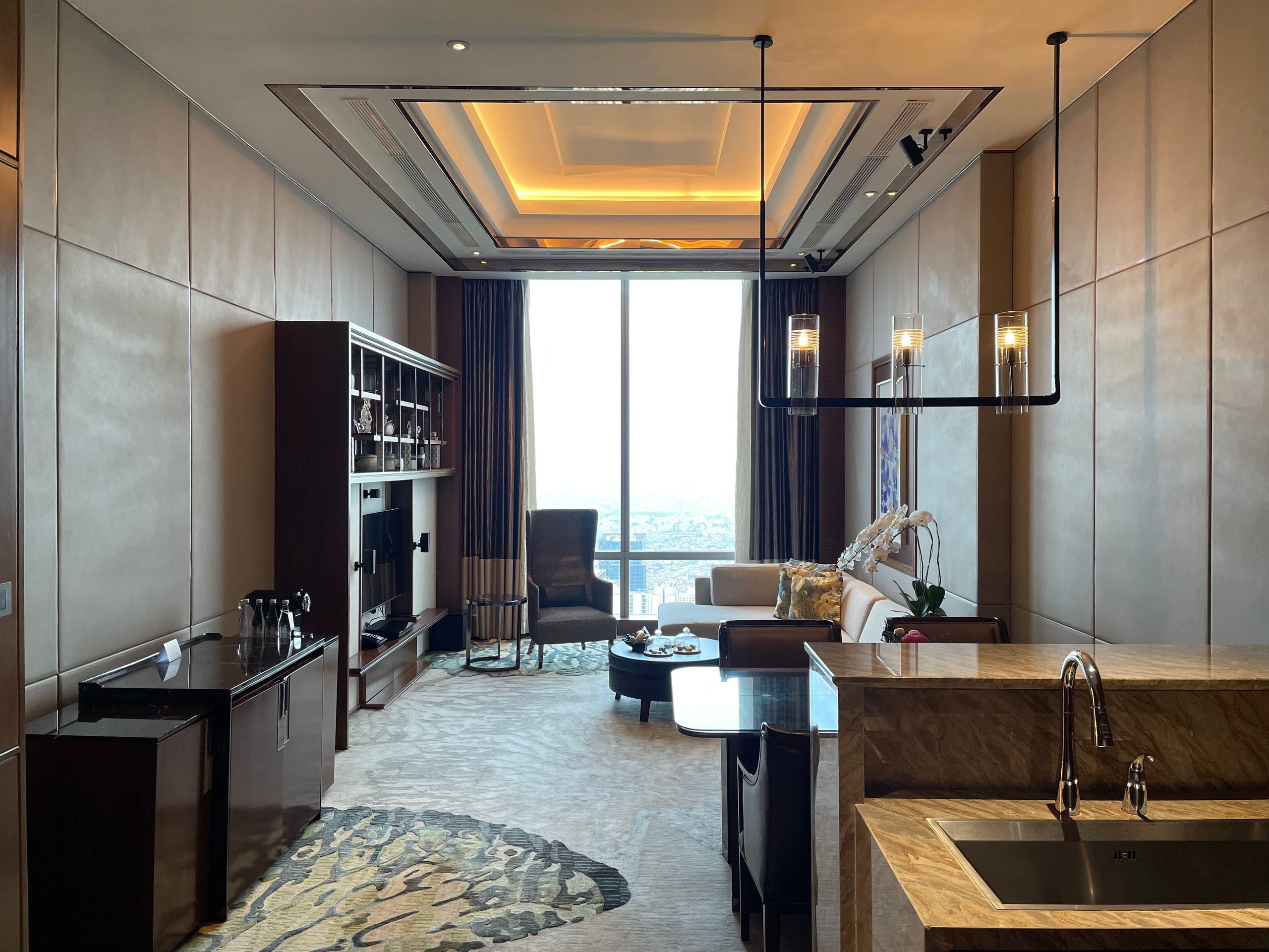 The living room of the Ambassador Suite at The Westin Jakarta