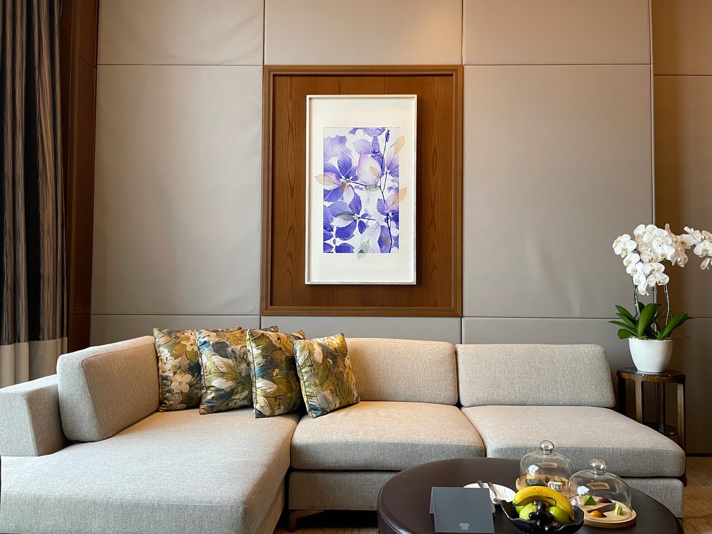 The living room of the Ambassador Suite at The Westin Jakarta