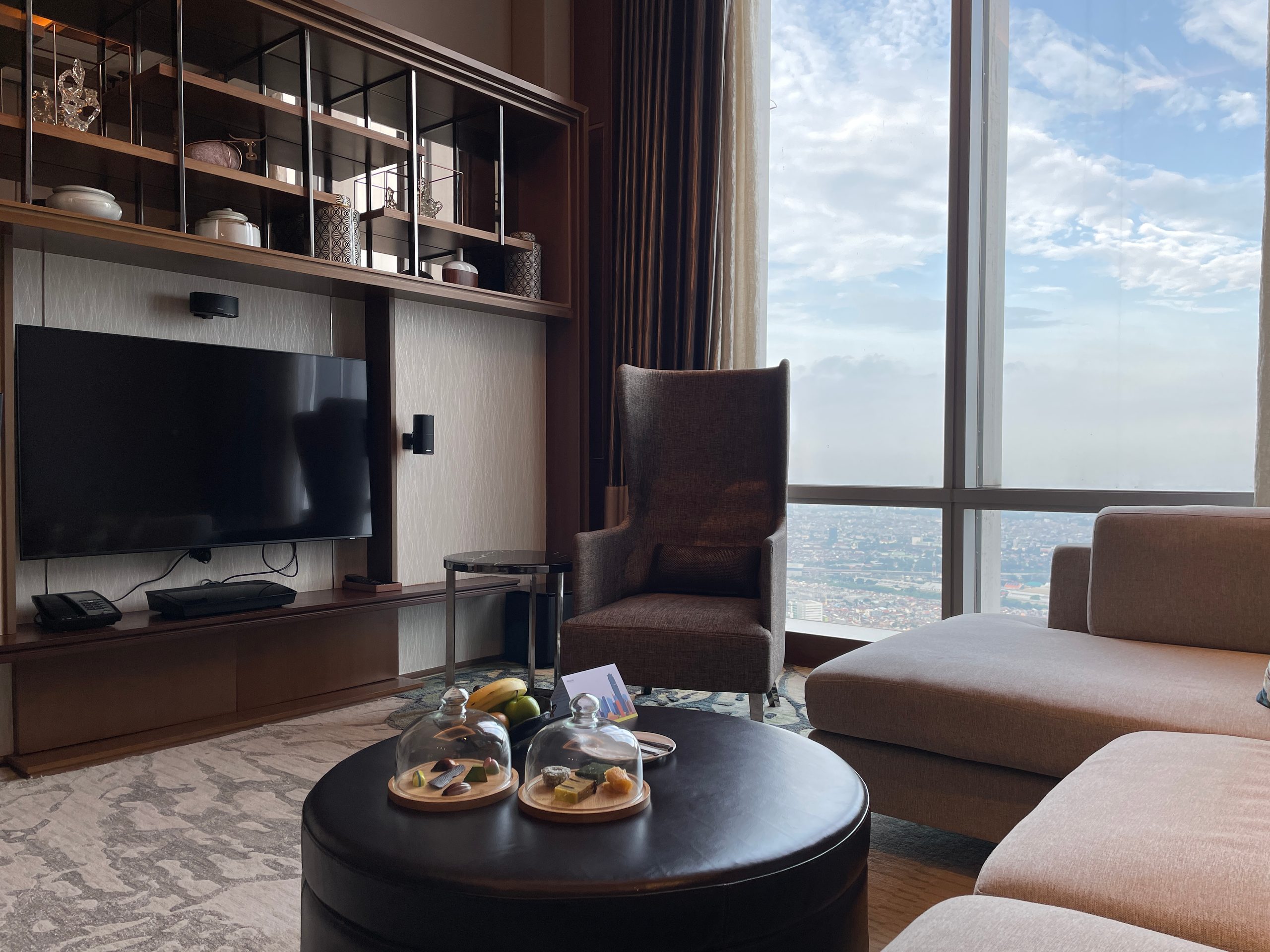 The living room of the Ambassador Suite at The Westin Jakarta
