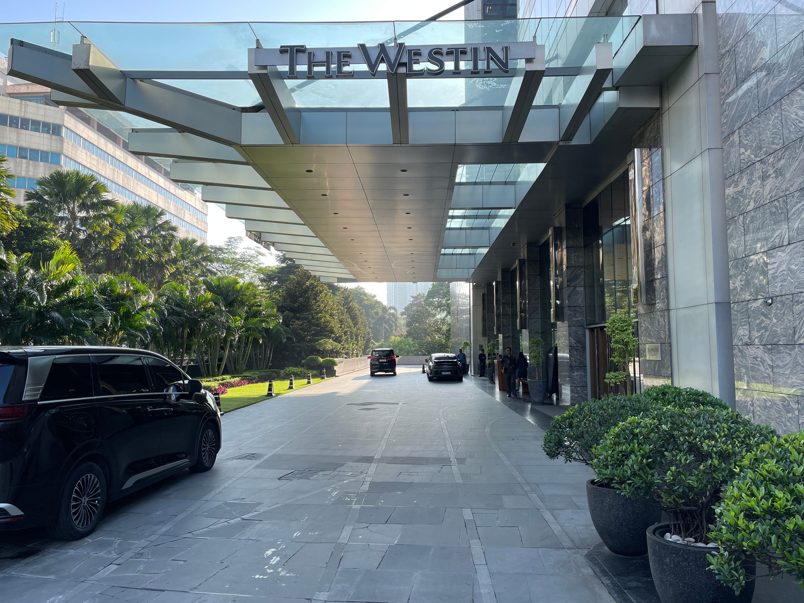 The covered porte-cochère, set back from Jalan H.R. Rasuna Said — The Westin Jakarta