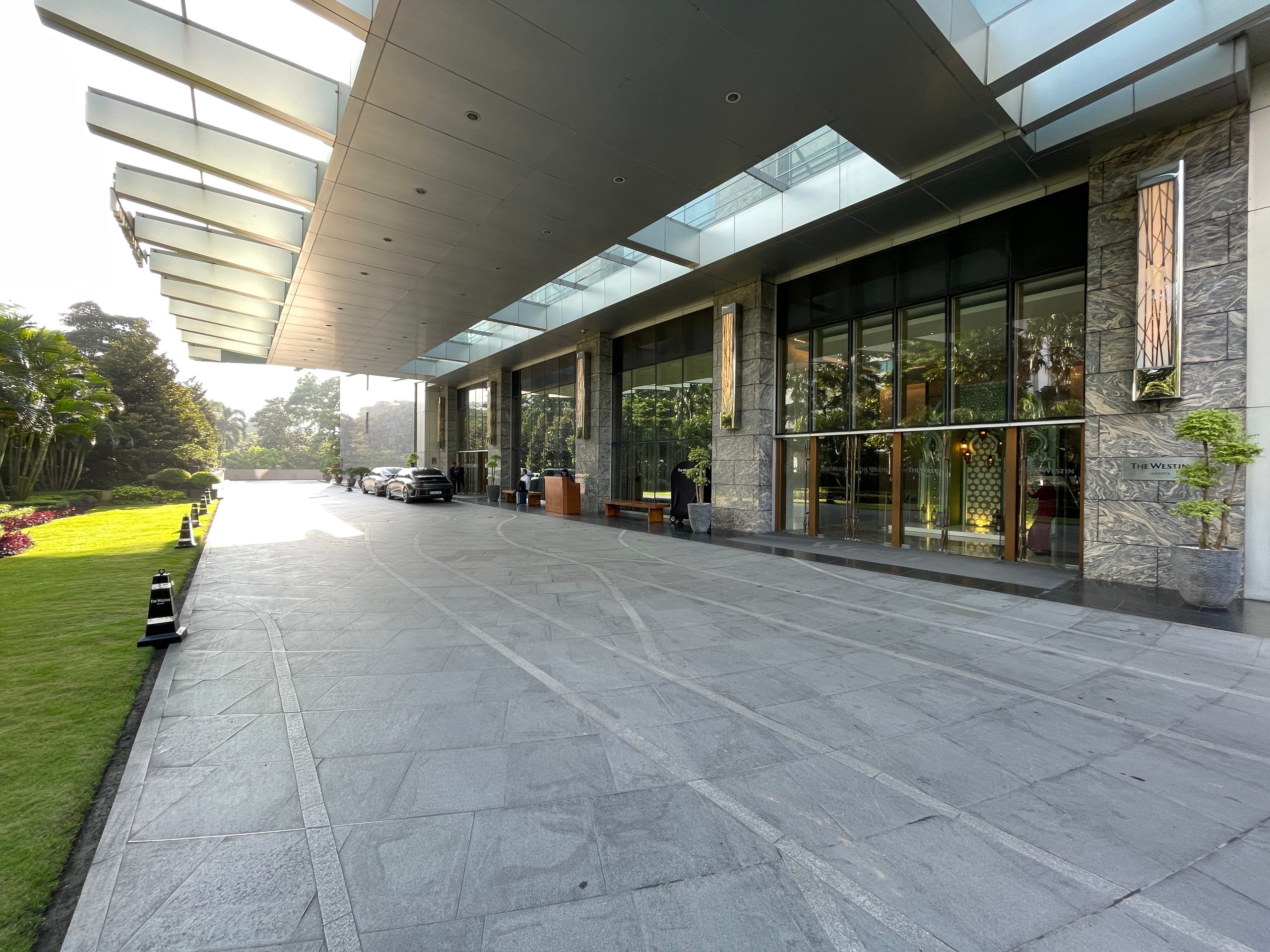The covered walkway from the drive-in — The Westin Jakarta