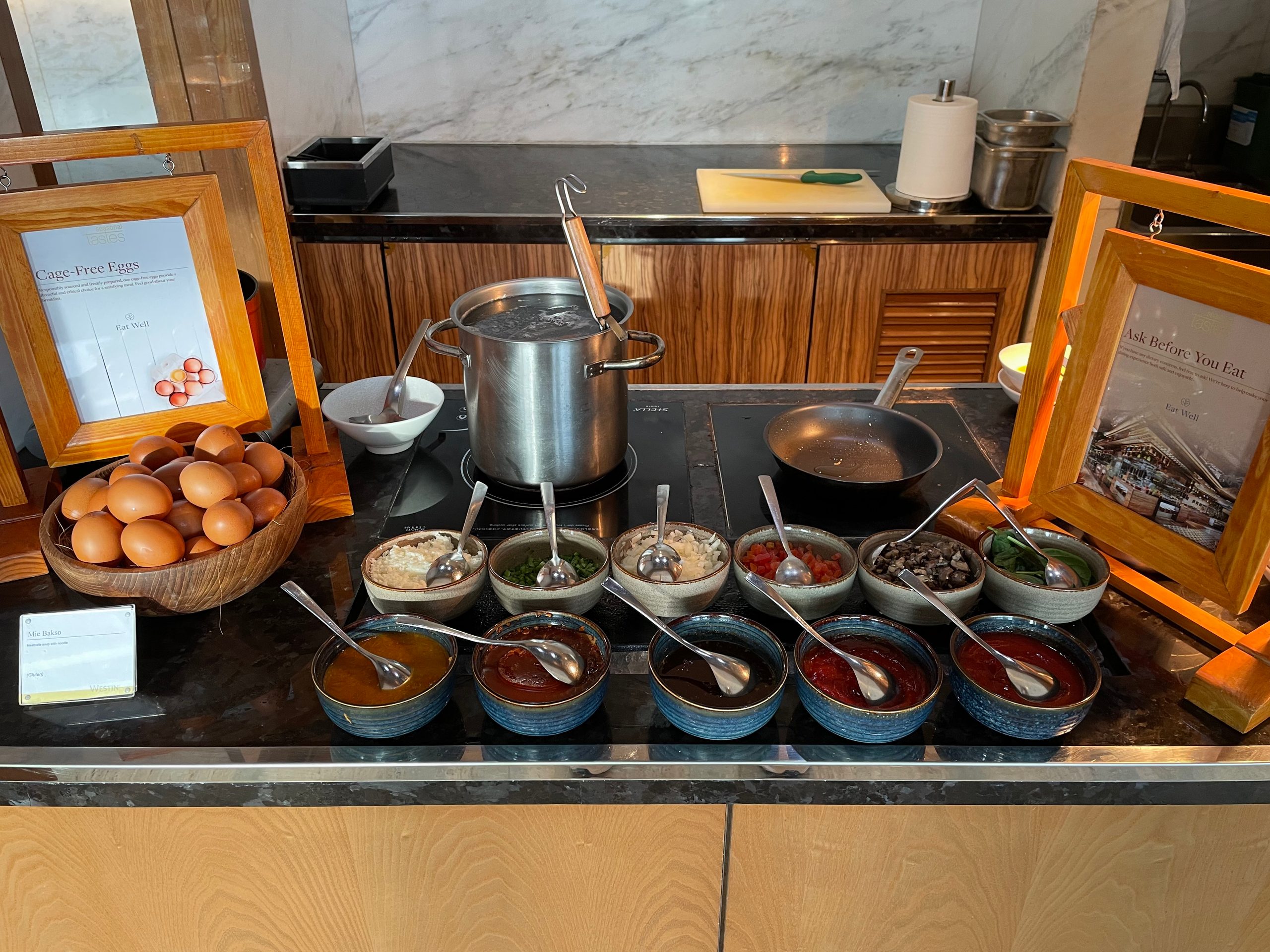 The Indonesian station, with sambals and condiments — The Westin Jakarta