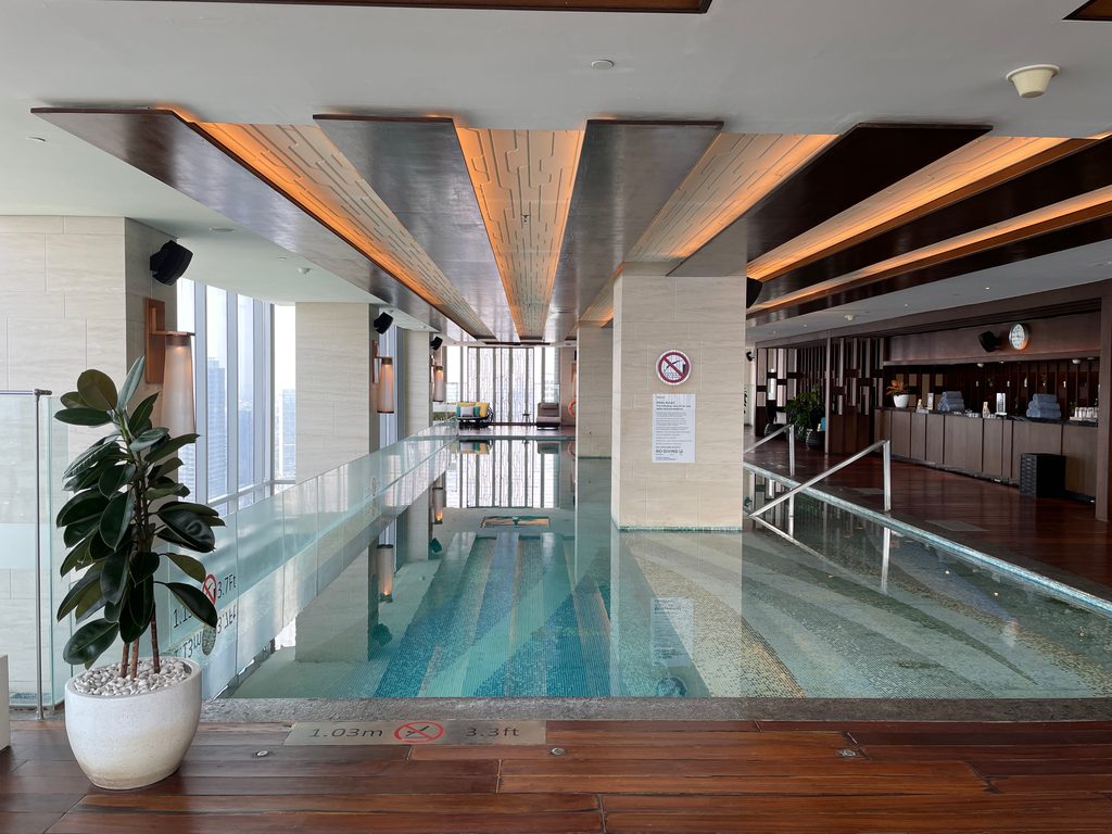 The indoor pool on level 50 at The Westin Jakarta, with city views