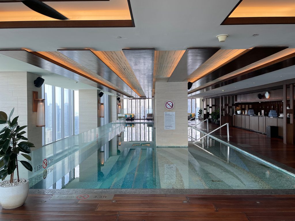 The indoor pool on level 50 at The Westin Jakarta, with city views