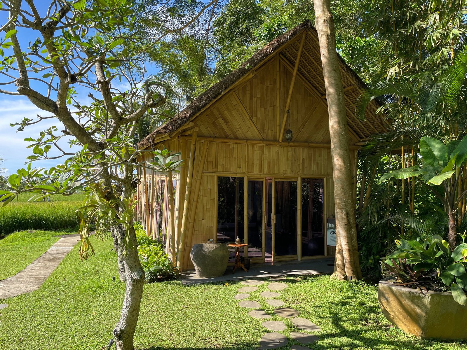 The bamboo fitness pavilion at Visesa Ubud at the edge of the rice fields