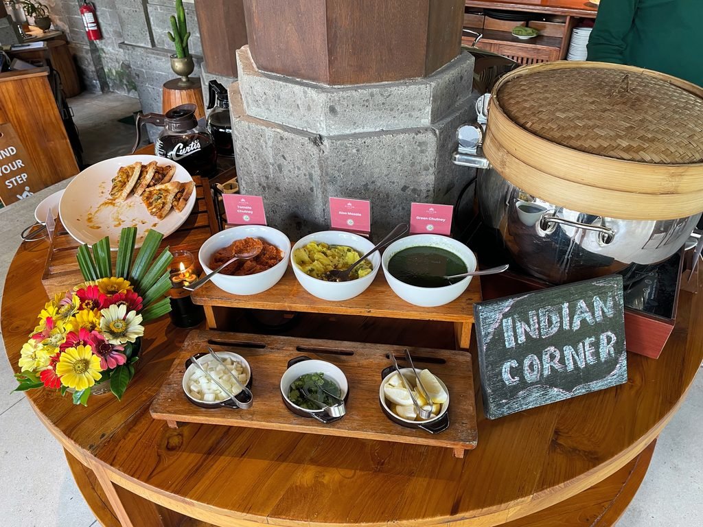 The Indian corner of the breakfast buffet at Lesung, Visesa Ubud, with curries and chutneys