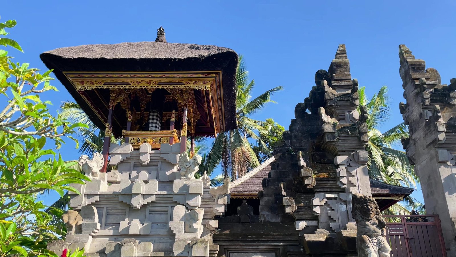 The candi bentar split gate and shrine roofs of the resort temple at Visesa Ubud