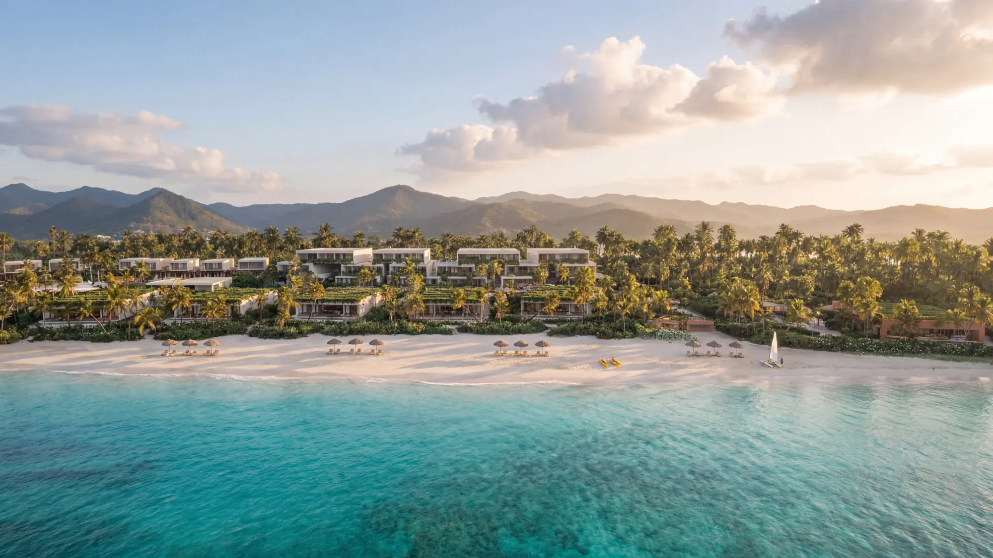 Rendering of a low-rise beach resort behind a white-sand beach and turquoise bay, with mountains beyond