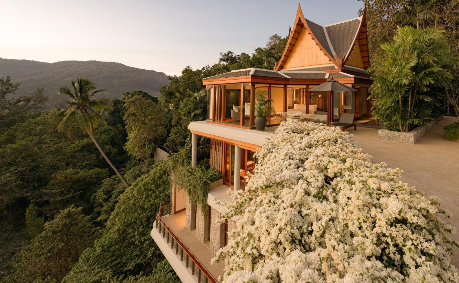 A Thai-roofed Amanpuri ocean villa on its forested hillside in Phuket