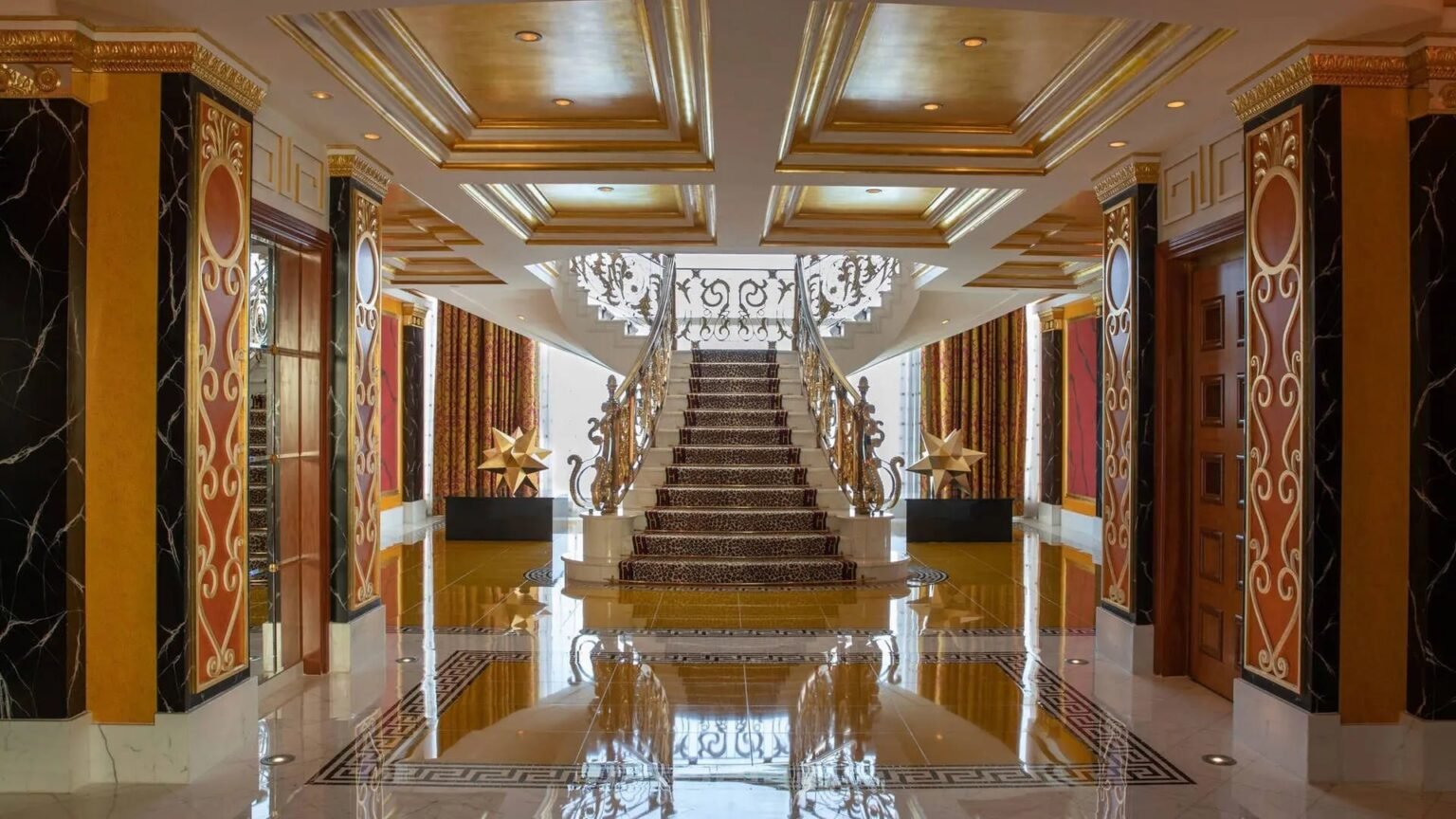 Gilded lobby and staircase inside Burj Al Arab
