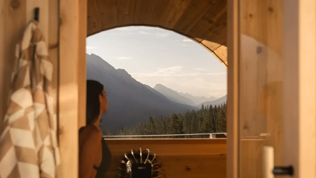 Barrel sauna framing a valley view at Rimrock Banff's Infinity Two-Bedroom Suite