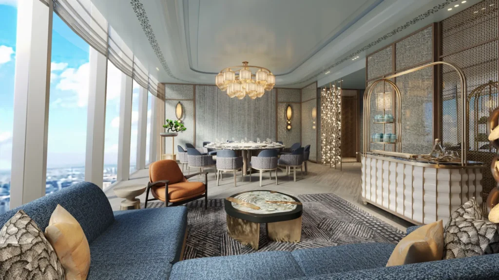 Private dining room with a blue sofa seating area, a round dining table and city views